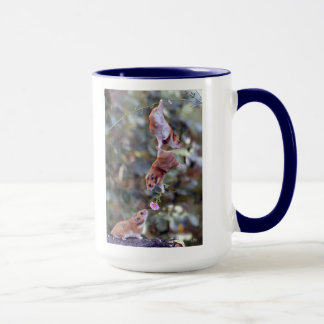 Tasse de souris d'attaque à  main armée