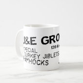 Tasse d'épicerie de J et d'E (Devant gauche)