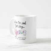 Tasse drôle "Chanter pire que les problèmes" (Devant gauche)