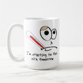 Tasse drôle se sentante de demain en difficulté (Gauche)