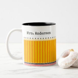 Tasse du crayon du professeur