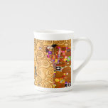 Tasse En Porcelaine Gustav Klimt Arbre de vie<br><div class="desc">Bone China Mug avec l’oeuvre murale de Gustav Klimt, The Tree of Life, The Stoclet Frieze (1905-1911). Il se compose de trois mosaïques : The Expectation, Knight et The Embrace. Une belle femme, un arbre doré et deux amants dans une étreinte sont représentés. Un cadeau merveilleux pour les amateurs d'Art...</div>