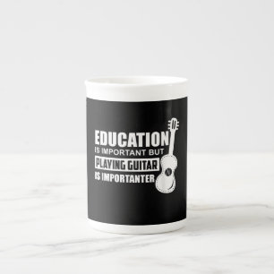 Tasse En Porcelaine L'Éducation Est Importante Mais Jouer De La Guitar