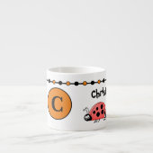 Tasse Expresso Bizarre orange noir avec étoiles enfant (Devant)