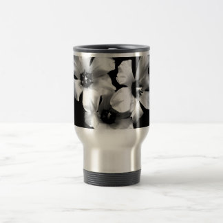 Tasse florale noire et blanche de voyage