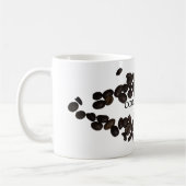 Tasse fraîche de grain de café d'haricots (Gauche)