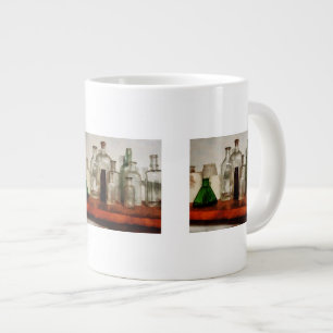Tasse Géante Bouteilles de médicaments hautes et basses