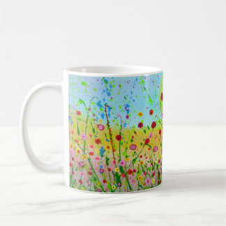 Tasse heureuse de fleurs