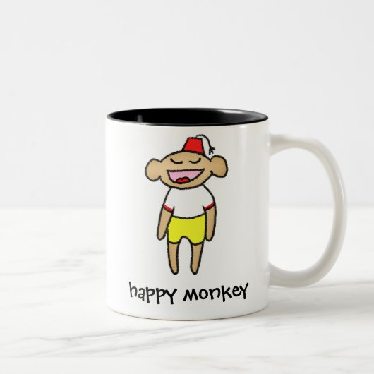 Tasse heureuse de singe (Droit)