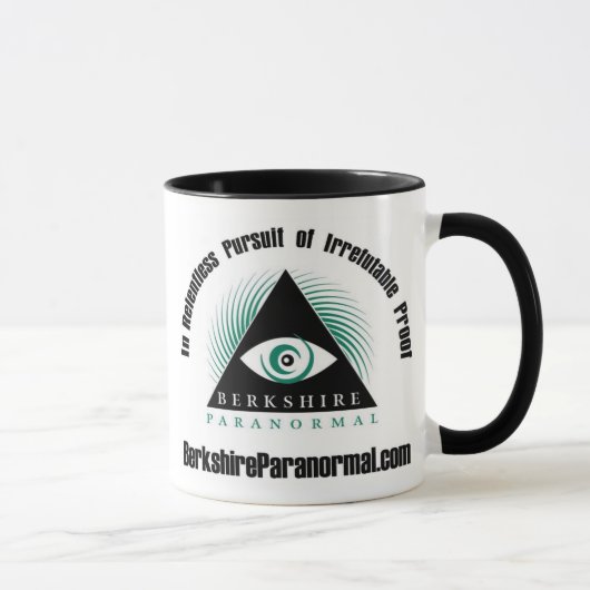 Tasse implacable de poursuite de groupe paranormal (Droite)