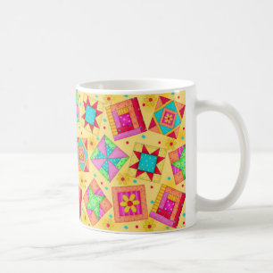 Tasse jaune de conception d'édredon de patchwork