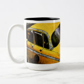 Tasse jaune de taxi (Gauche)