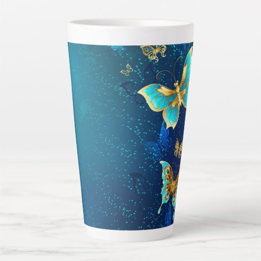 Tasse Latte Papillons d'or sur un Arrière - plan bleu (Devant)