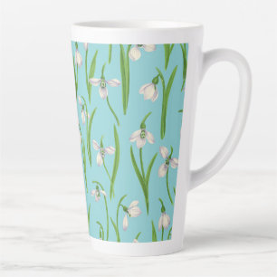 Tasse Latte Perce-neige sur fond bleu piscine