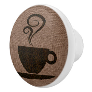 Tasse moulue sur la toile de jute - bouton de