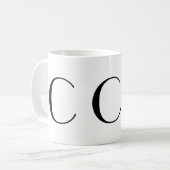 Tasse noire d'art déco du monogramme C (Devant gauche)