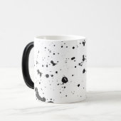Tasse noire de peinture d'éclaboussure (Devant gauche)