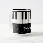 Tasse noire et blanche de musique de piano (Devant gauche)