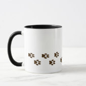 Tasse noire somnolente de chiot de laboratoire (Gauche)