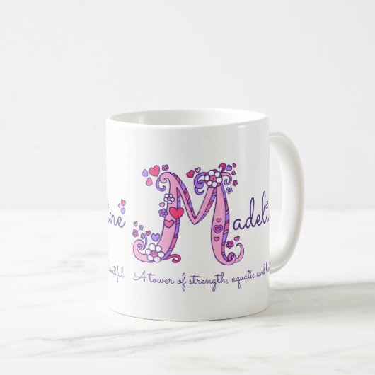 Tasse nommée de monogramme de la lettre M de (Devant droit)