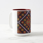 Tasse orange des soleils de broderie de Vyshyvanka (Devant gauche)
