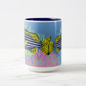 Tasse orientale de poissons de récif de Sweetlips (Centre)