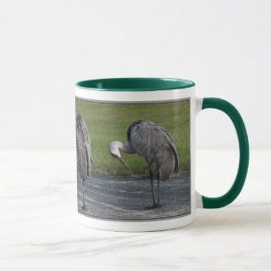 Tasse pour des amants de grue de colline de sable