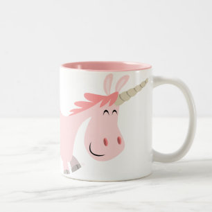 Tasse rose de licorne de bande dessinée