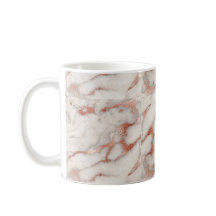 Tasse rose de marbre d'or