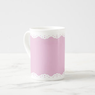 Tasse rose de porcelaine tendre d'équilibre