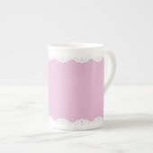 Tasse rose de porcelaine tendre d'équilibre (Devant droit)