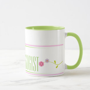 Tasse rose et verte de psychologue d'école de café