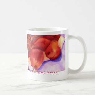 Tasse rouge de poires
