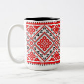 Tasse rouge des soleils de broderie de Vyshyvanka (Gauche)
