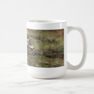 Tasse sauvage de loup "sur course"