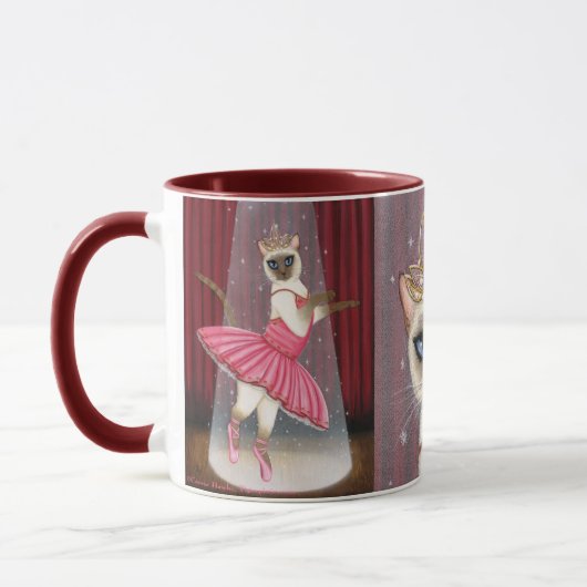 Tasse siamoise de danseur de point de chocolat de (Gauche)