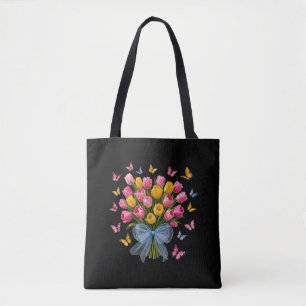 Tassen met tulpen en vlinders