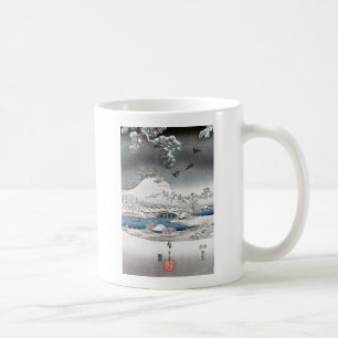 Tasses et tasses de paysage de neige