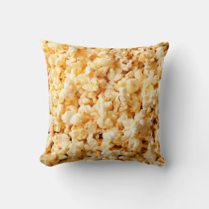 Tasty popcorn op de hele achtergrond. Eten Kussen