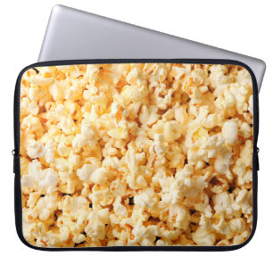 Tasty popcorn op de hele achtergrond. Eten  Laptop Sleeve