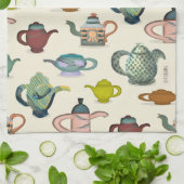 Tea potten in een theekdoek theedoek (Gevouwen)