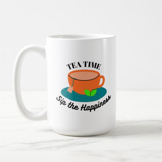 tea time mignon tasse orange et feuilles verts (Gauche)