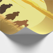 Team van cowboys silhouette galloping tegen een zo cadeaupapier (Hoek)