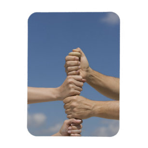 Teamhandjes in de tas magneet