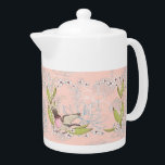 Teapot à la florale rose et conception d'oiseaux<br><div class="desc">Teapot au design floral et ornithologique rose pâle. Les fleurs sont blanches,  l'oiseau est rose avec des ailes ouvertes et il y a de beaux feuilles verts. Merci à Creative Fabrica,  et le Hungryjpeg pour certains des éléments du design.</div>