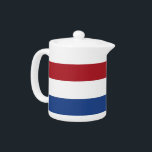 Teapot Pays-Bas Flag<br><div class="desc">Ajoutez une touche d'élégance hollandaise à votre collection de thé avec notre théière exclusive avec le drapeau de la Pays-Bas! Réalisée avec une attention minutieuse aux détails, cette théière est plus qu’un simple élément fonctionnel, c’est une célébration du patrimoine néerlandais et de la fierté culturelle. Le design saisissant affiche le...</div>