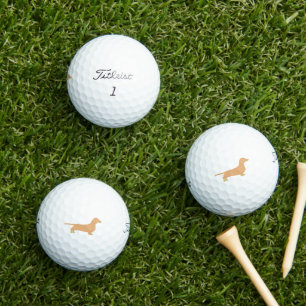 teckel fawn en tan silhouet golfballen