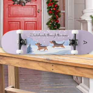 Teckels door de sneeuw monogrammed kerst skateboard