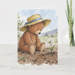 Teddibeer die naar een groeiende madelief staart kaart