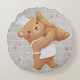Teddy de bakker met croissant rond kussen